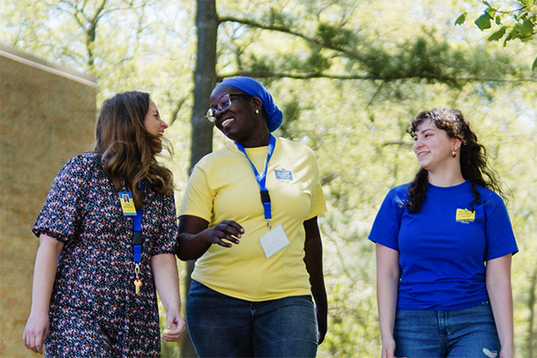 diverse female students talk